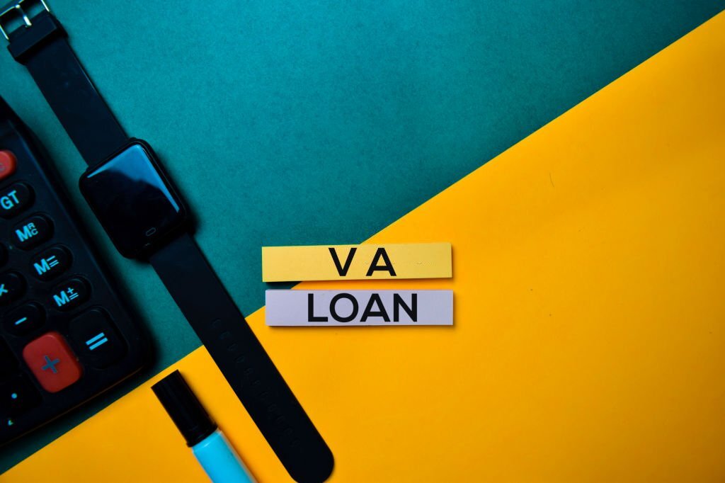 VA Loan text on top view color table background.